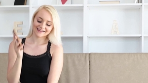 Pretty blonde fucks with dildo